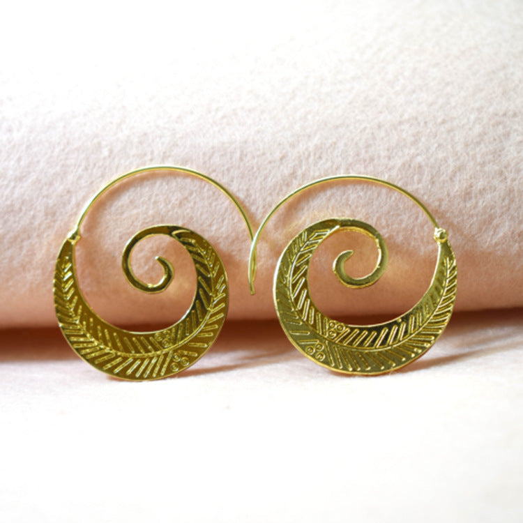 Boucles d'oreilles spirales dorées Moyyudé avec gravures élégantes et design en spirale unique