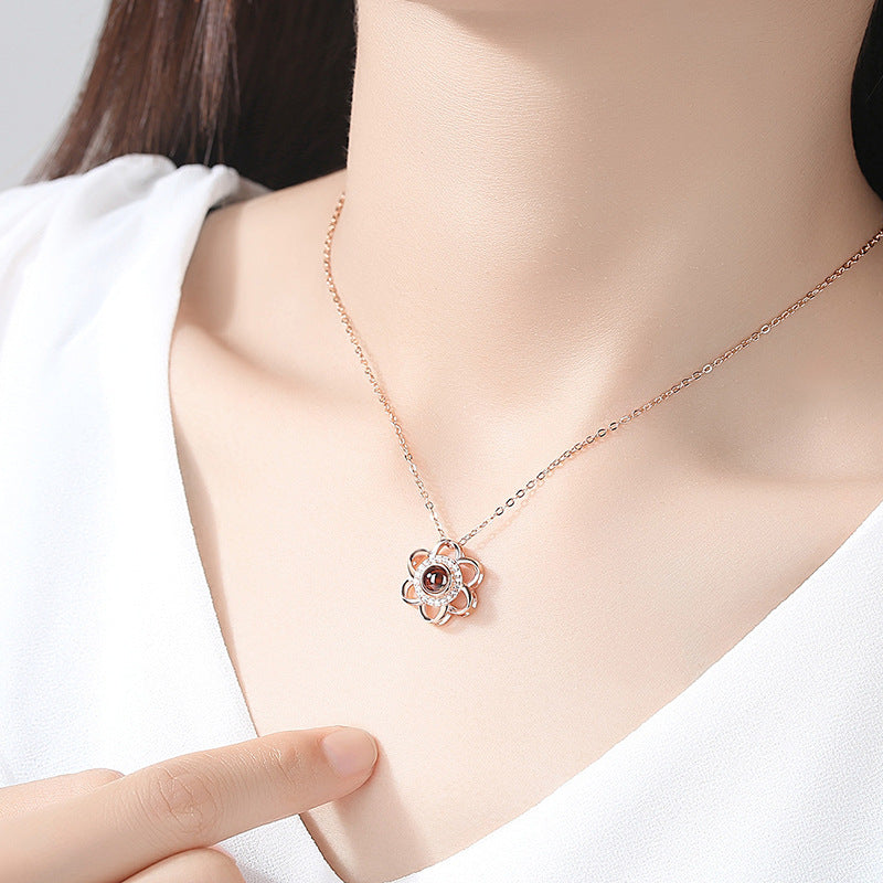 Collier femme Moyyudé avec pendentif fleur de cerisier en métal argenté délicat