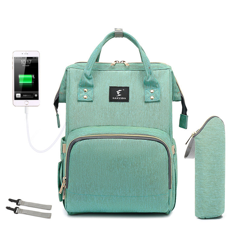 Sac à langer avec lit intégré Moyyudé vert menthe avec port de chargement USB et pochette assortie