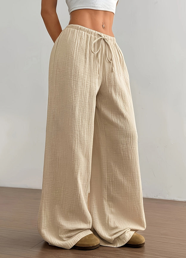 Pantalon femme décontracté beige à taille élastique avec cordon, coupe large et tissu léger