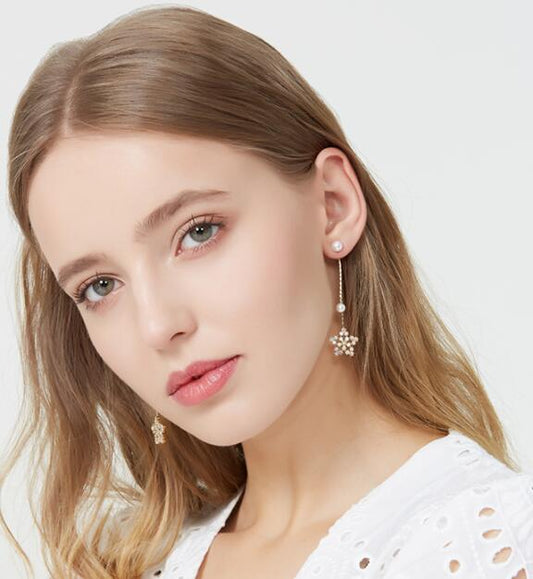 Boucles d'oreilles Moyyudé élégantes portées par femme bijou lifestyle mode féminine