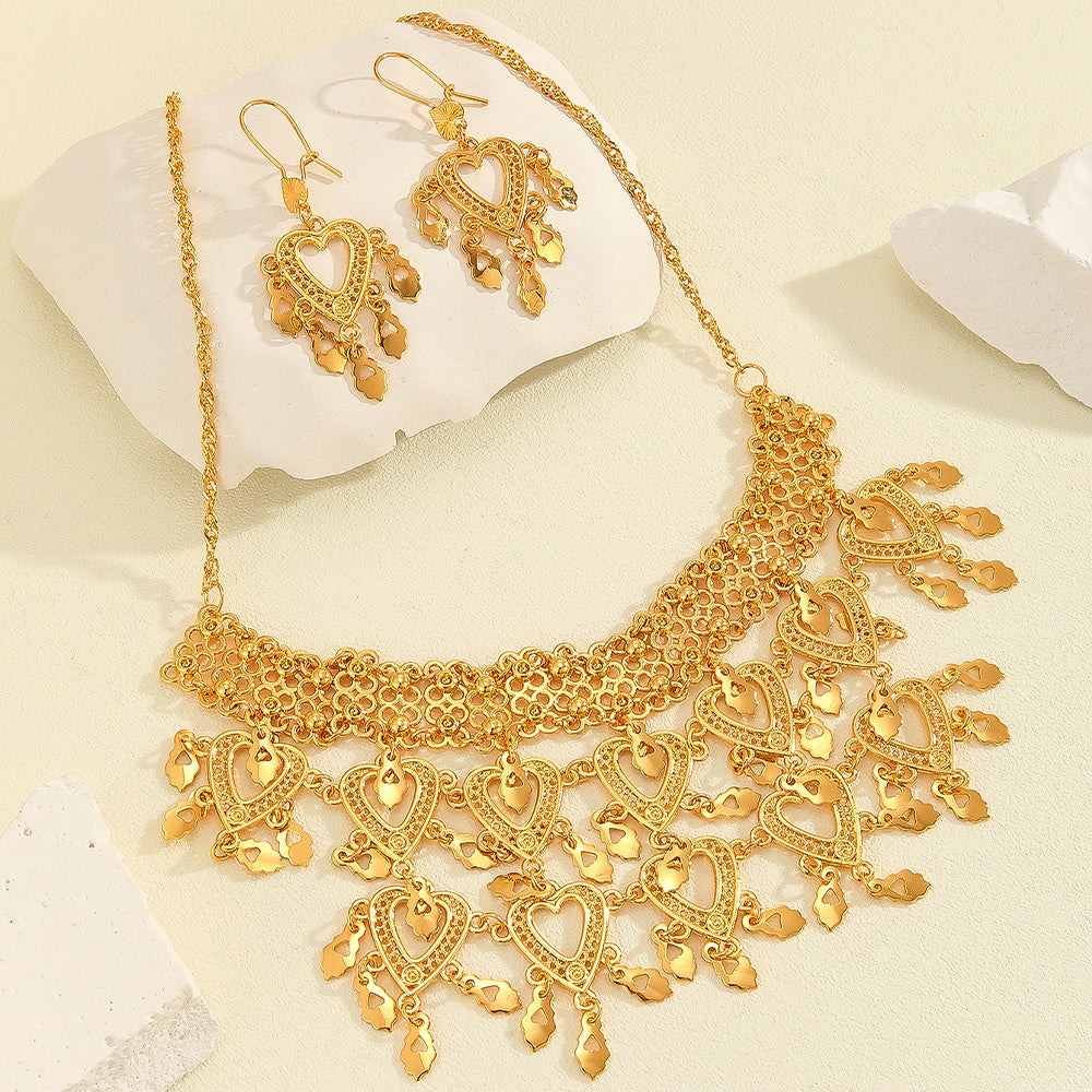 Parure princesse dorée Moyyudé avec collier et boucles d'oreilles en métal doré finement décoré