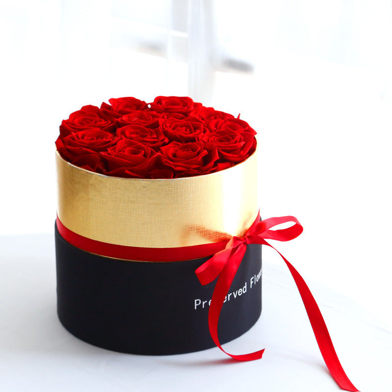 Pot de fleurs en cœur avec roses rouges séchées dans boîte noire et or Moyyudé