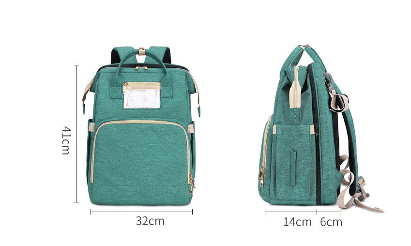 Sac A Langer Avec Lit Intégré Moyyudé vert avec multiples poches et dimensions compactes